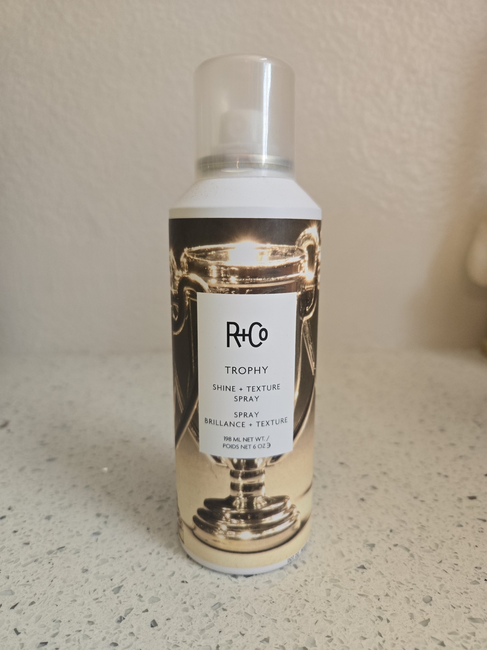 R+Co Trophy Shine + Texture Spray — Gold and White Finish